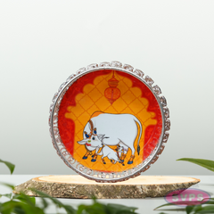 Silver Colored Metal Pichwai Serving Tray With Cow And Calf