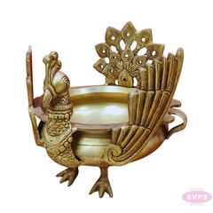 Antique Brass Peacock Urli Bowl – Majestic Bird Design with Feathered Tail Backrest