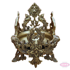 Antique Brass Peacock Design Urli Bowl – Ornate Floral Carving with Traditional Stand