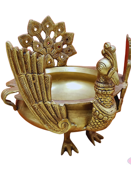Antique Brass Peacock Urli Bowl – Majestic Bird Design with Feathered Tail Backrest
