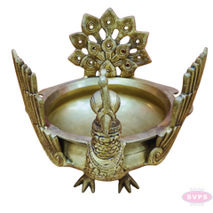 Antique Brass Peacock Urli Bowl – Majestic Bird Design with Feathered Tail Backrest