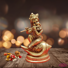 Brass Baby Krishna Seated On Conch /Shank / Playing Flute