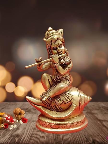 Brass Baby Krishna Seated On Conch /Shank / Playing Flute