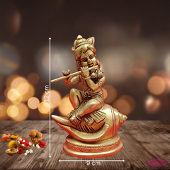 Brass Baby Krishna Seated On Conch /Shank / Playing Flute