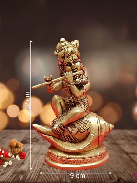 Brass Baby Krishna Seated On Conch /Shank / Playing Flute