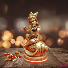 Brass Baby Krishna Seated On Conch /Shank / Playing Flute