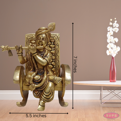 Brass Flute Krishna Sitting On Swing Chair