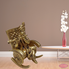 Brass Flute Krishna Sitting On Swing Chair