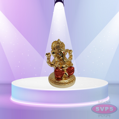 Resin Ganesha Gold Silver Coated With Red Dhothi