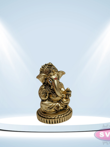 Resin Ganesha With Laddu  Gold / Silver Coated