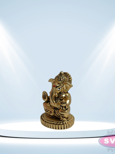 Resin Ganesha With Laddu  Gold / Silver Coated