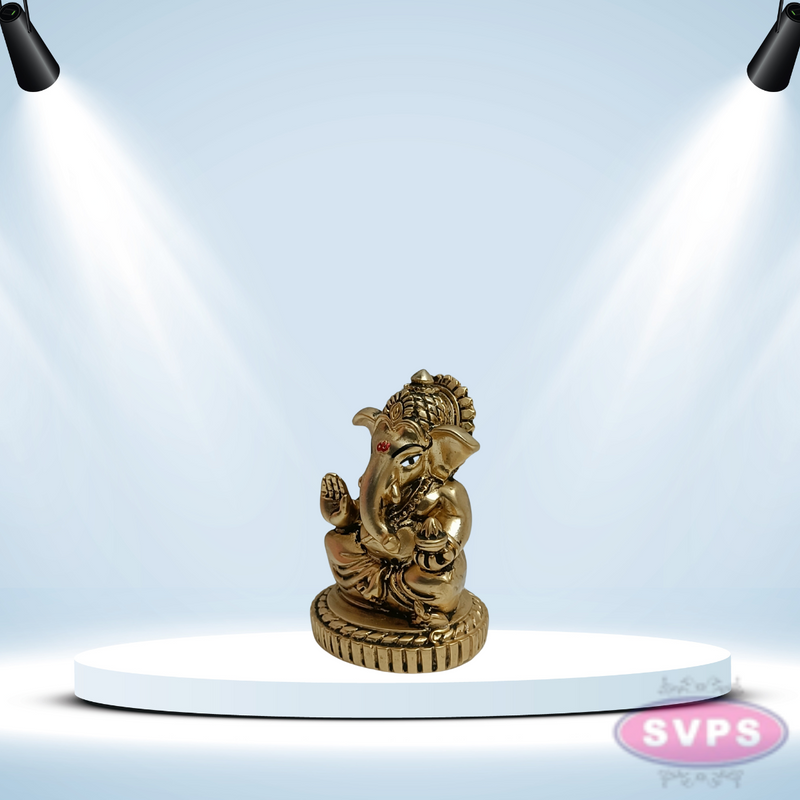 Resin Ganesha With Laddu  Gold / Silver Coated