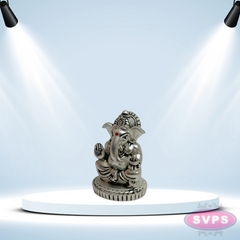 Resin Ganesha With Laddu  Gold / Silver Coated