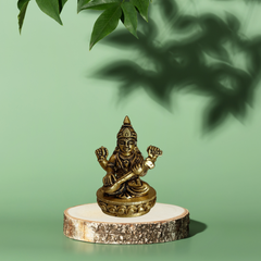 Goddess Saraswati Sitting on Lotus – Brass Pooja Idol