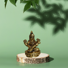 Goddess Saraswati Sitting on Lotus – Brass Pooja Idol