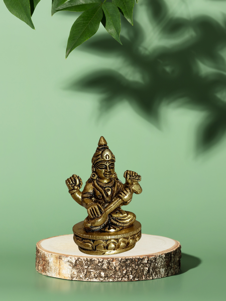 Goddess Saraswati Sitting on Lotus – Brass Pooja Idol