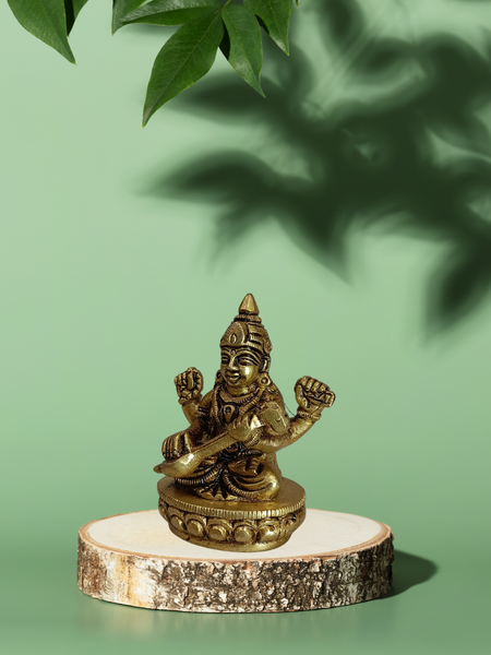 Goddess Saraswati Sitting on Lotus – Brass Pooja Idol