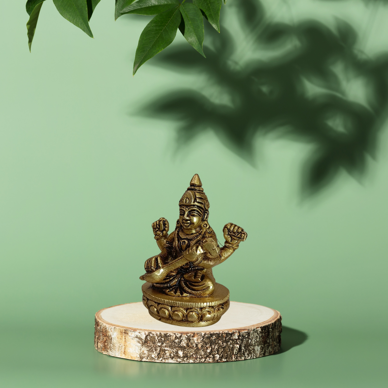 Goddess Saraswati Sitting on Lotus – Brass Pooja Idol