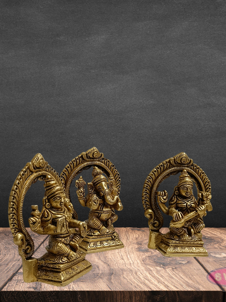 Brass Lakshmi Ganesha Saraswati Idol Set with Prabhavali Arch
