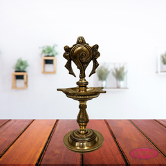 Antique Finish Brass Shankh Chakra Oil Lamp with Divine Design