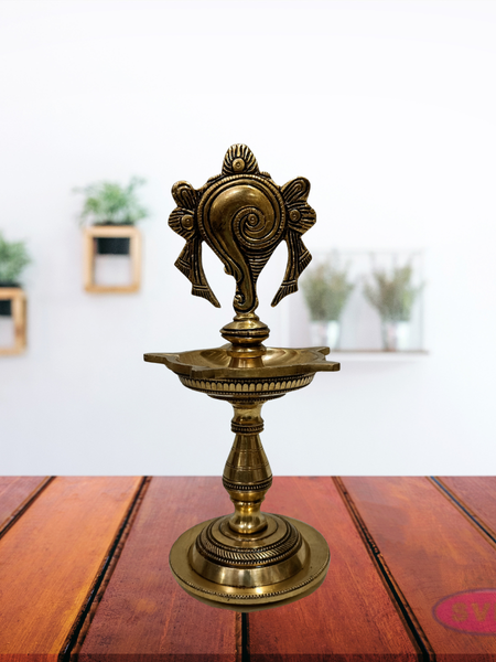 Antique Finish Brass Shankh Chakra Oil Lamp with Divine Design