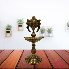 Antique Finish Brass Shankh Chakra Oil Lamp with Divine Design