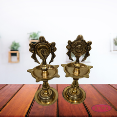 Antique Finish Brass Shankh Chakra Oil Lamp with Divine Design